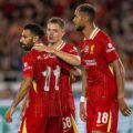 Liverpool players congratulate each other after scoring against Yokohama