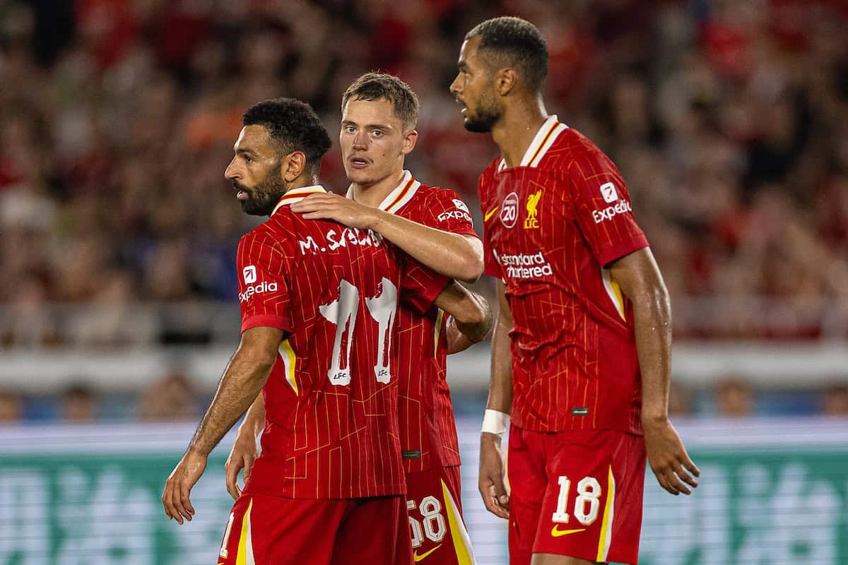 Liverpool players congratulate each other after scoring against Yokohama