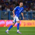 Lorenzo Lucca with Italy's national shirt