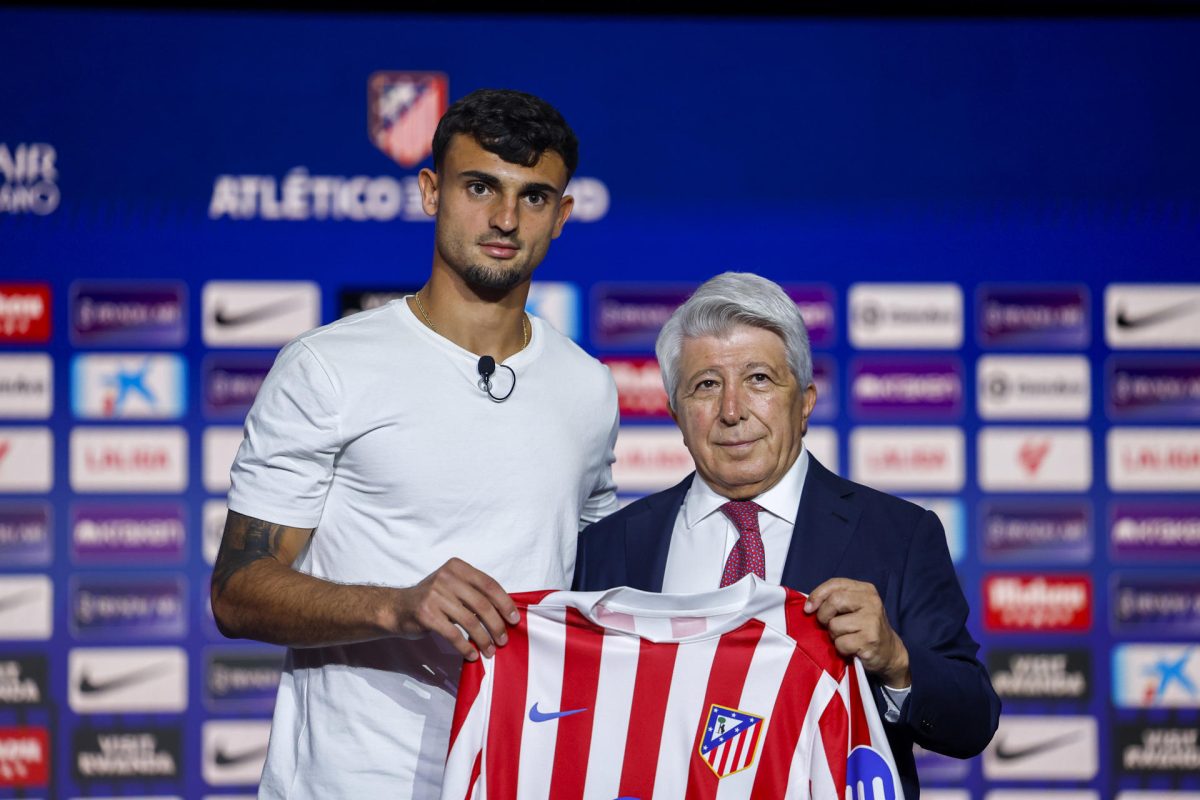 Atetico Madrid president Enrique Cerezo and club new signing Marc Pubill
