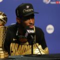 Shai Gilgeous-Alexander in a press conference with the NBA Finals MVP trophy