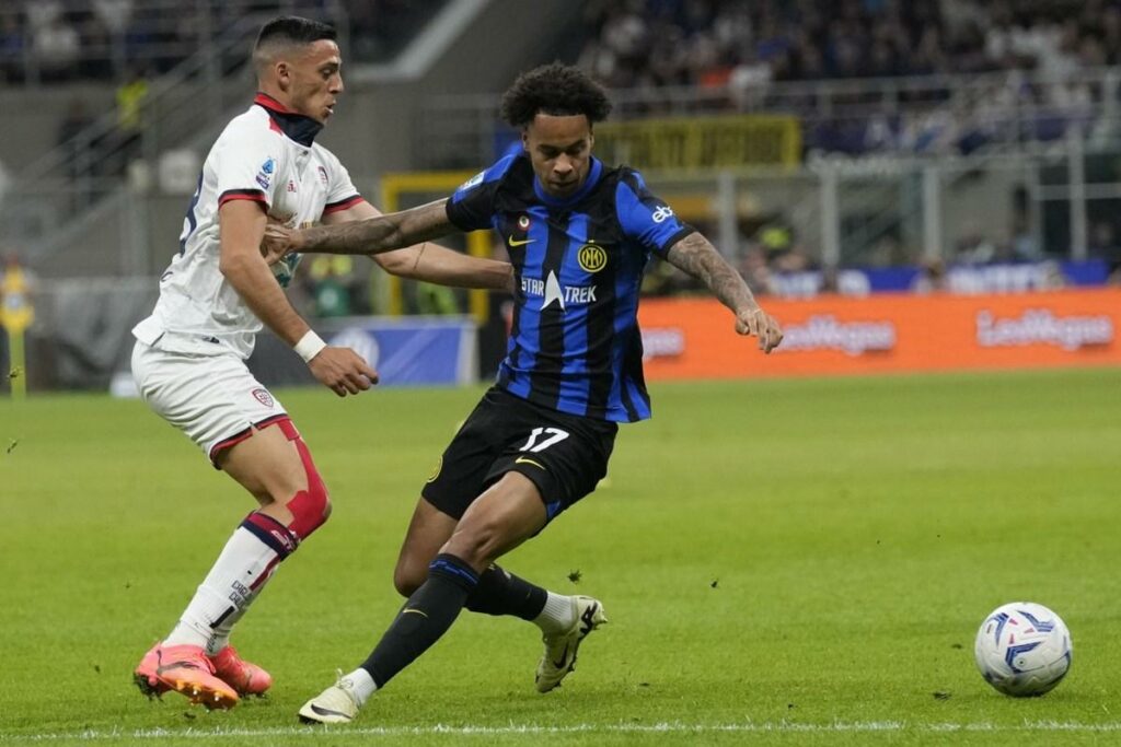Former Inter winger Tajon Buchanon trying to stop an opponent