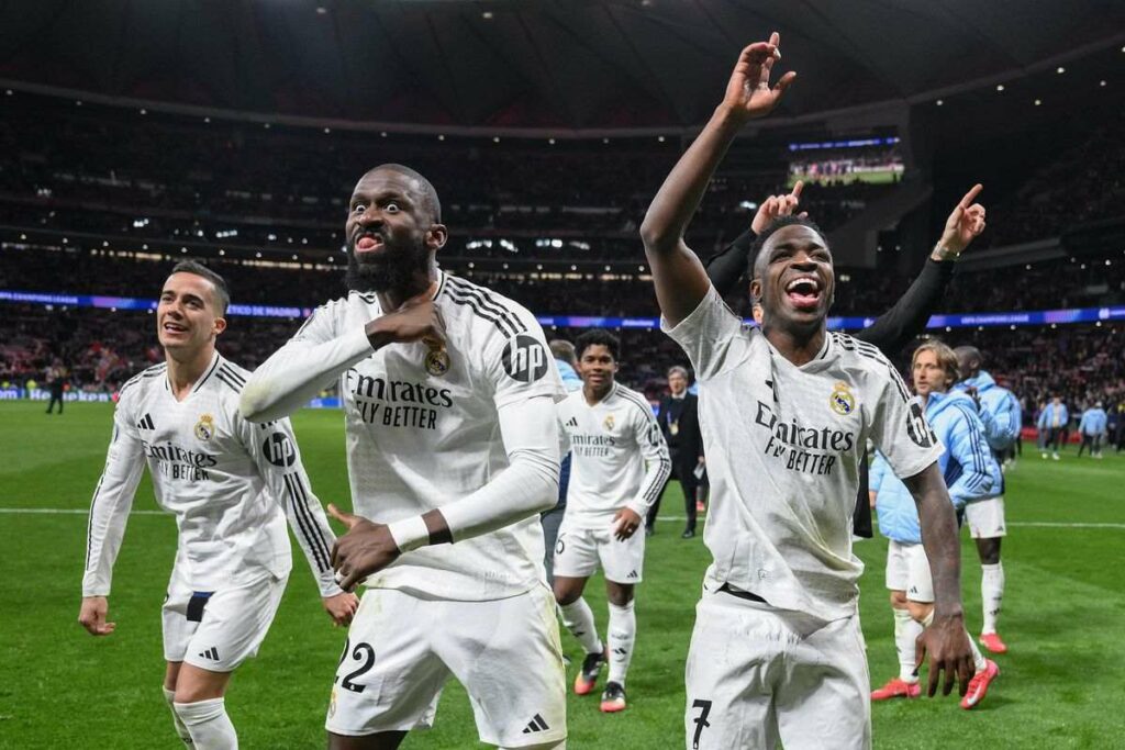 Real Madrid players celebrate after eliminating Atletico Madrid in the Champions League