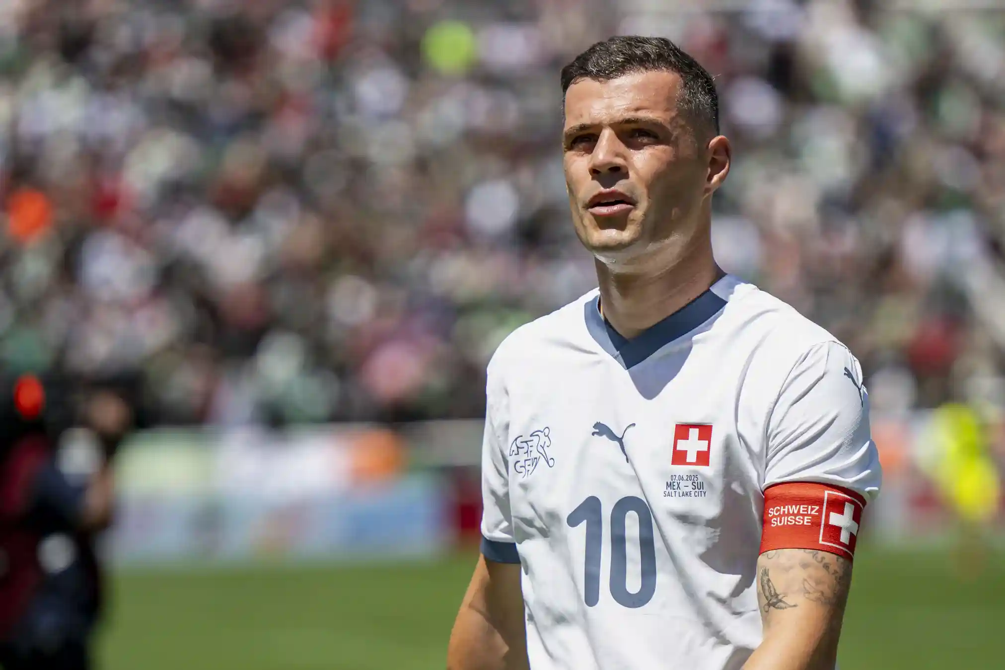 Granit Xhaka leading Switzerland with the captain's armbrand