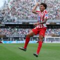 Axel Witsel jumping and celebrating after scoring for Atletico Madrid