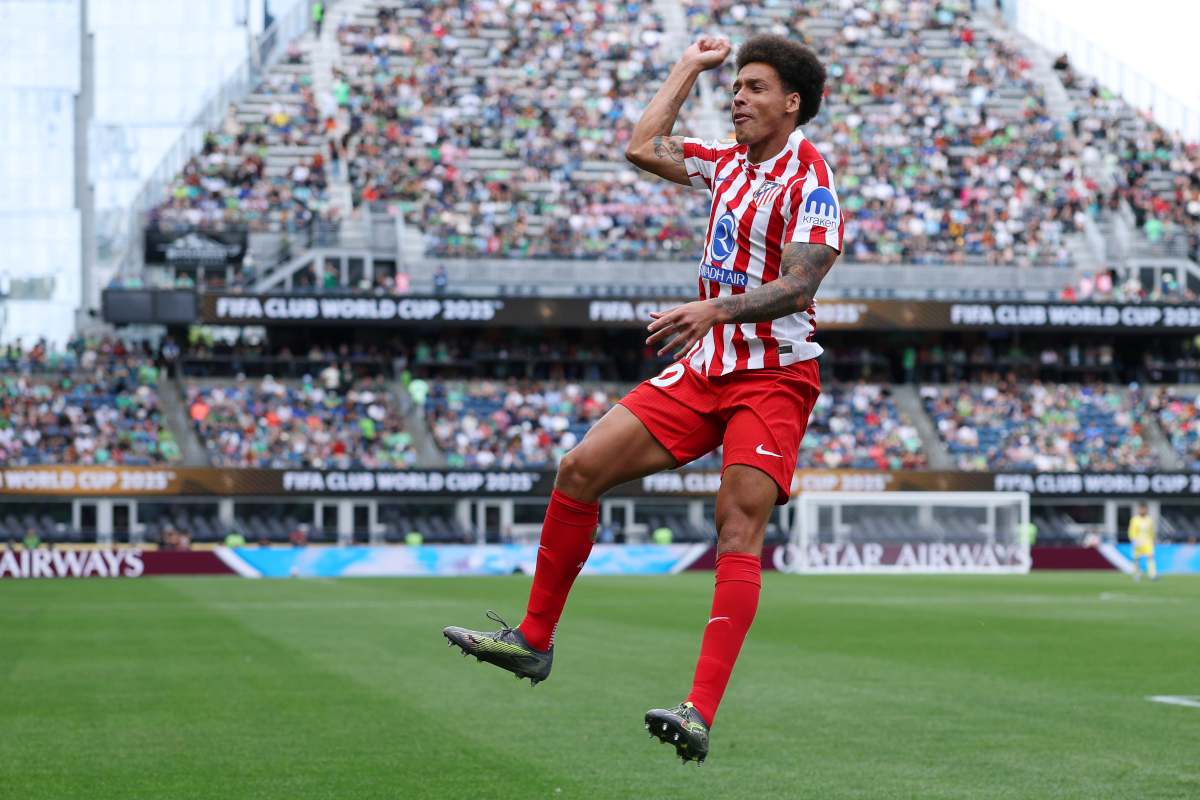 Axel Witsel jumping and celebrating after scoring for Atletico Madrid