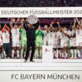Bayern Munich players celebrating with the 2025 Bundesliga title