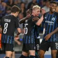 Club Brugge players celebrate after scoring against Rangers