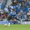 Brighton midfielder Carlos Baleba running with the ball