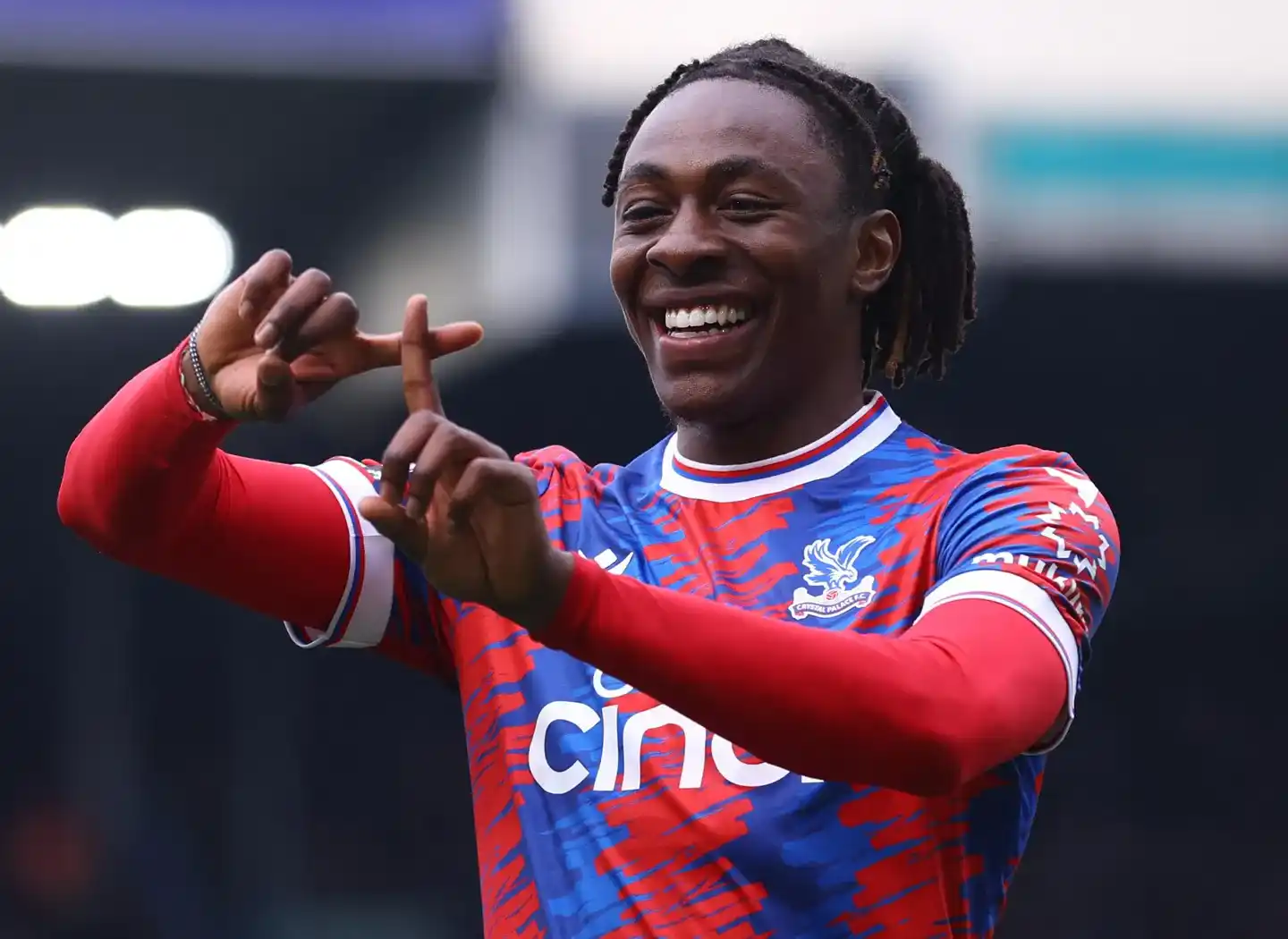 Crystal Palace midfielder Eberechi Eze with his typical celebration after scoring a goal