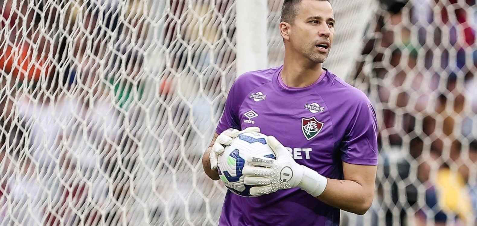 Fluminense goalkeeper Fabio holding the ball