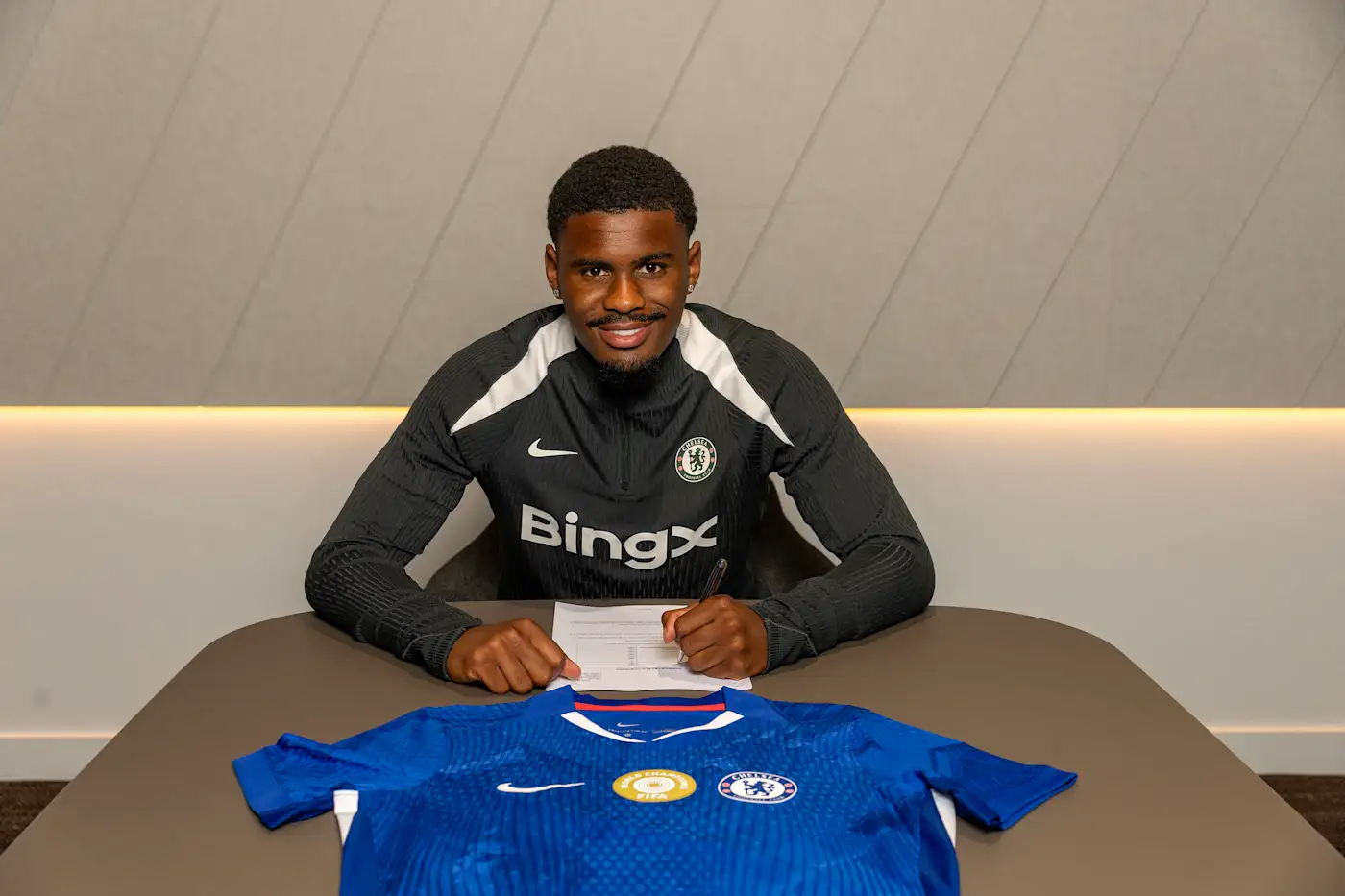 New Chelsea defender Jorrel Hato signing his contract