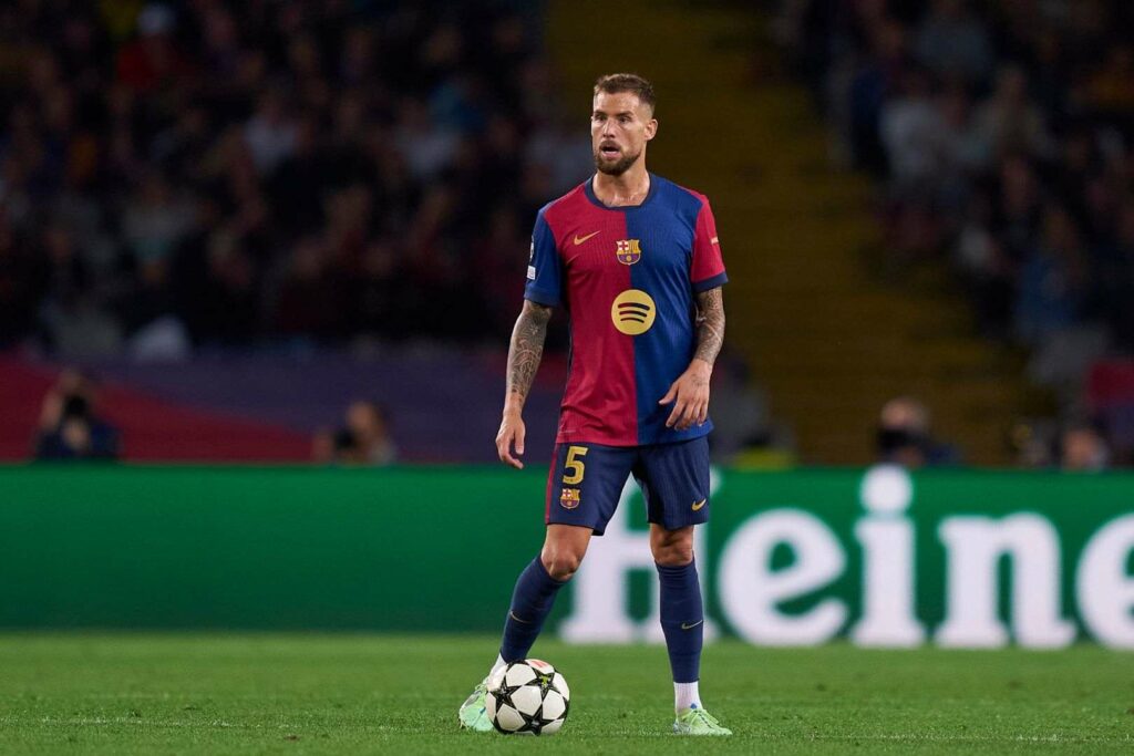 Barcelona defender Inigo Martinez with the ball at his feet