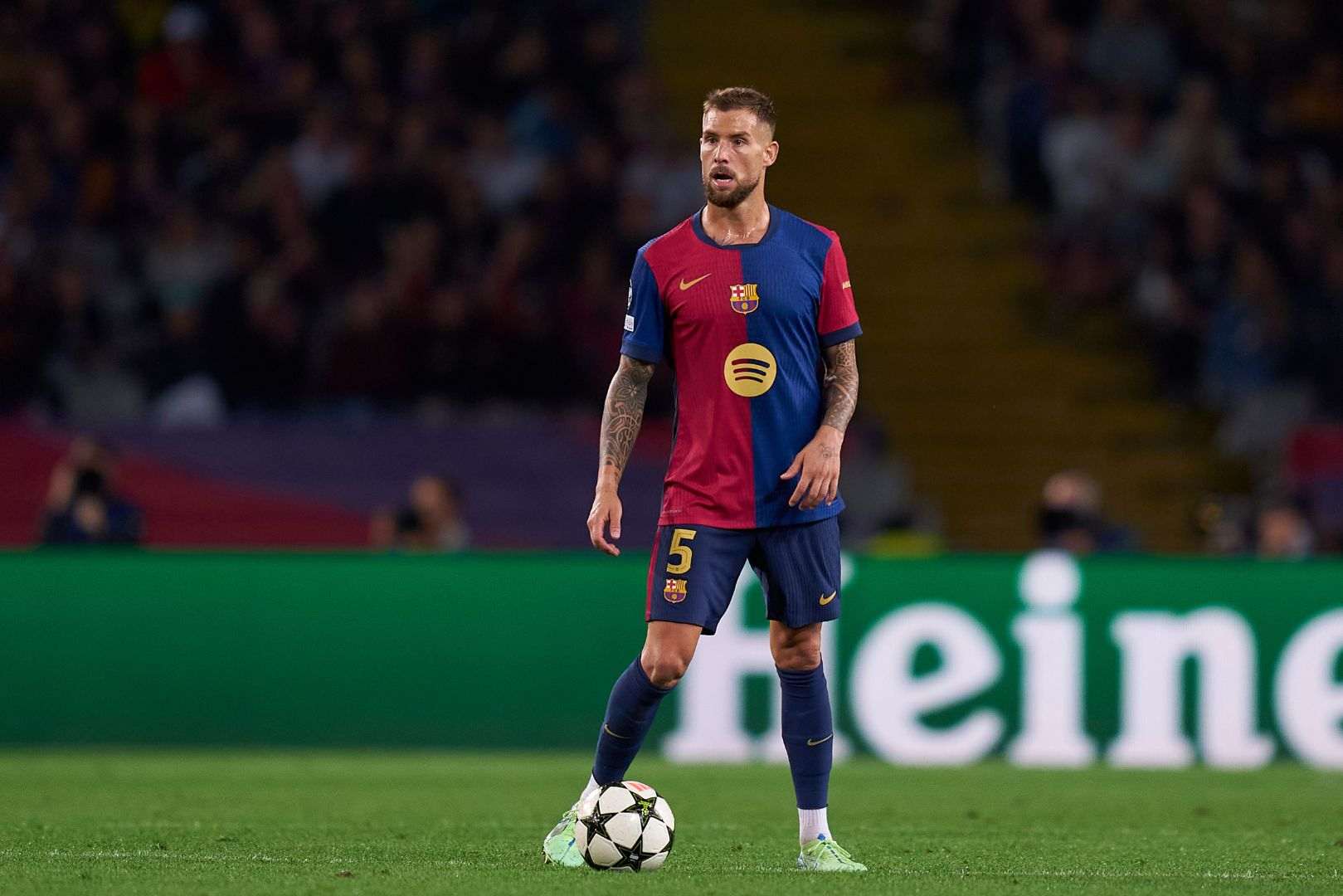 Barcelona defender Inigo Martinez with the ball at his feet