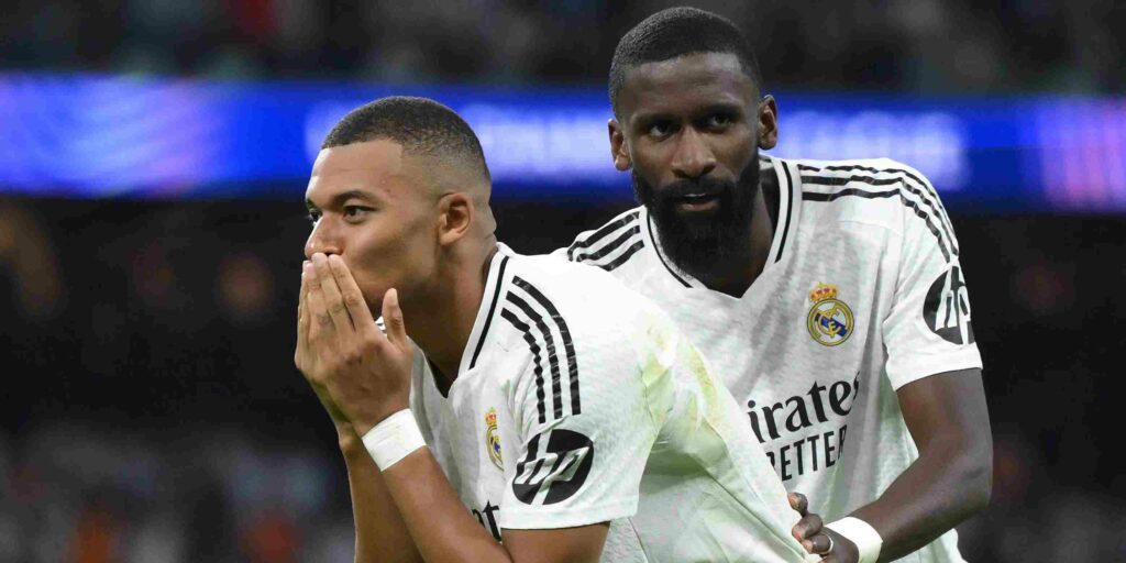 Kylian Mbappe and Antonio Rudiger celebrate