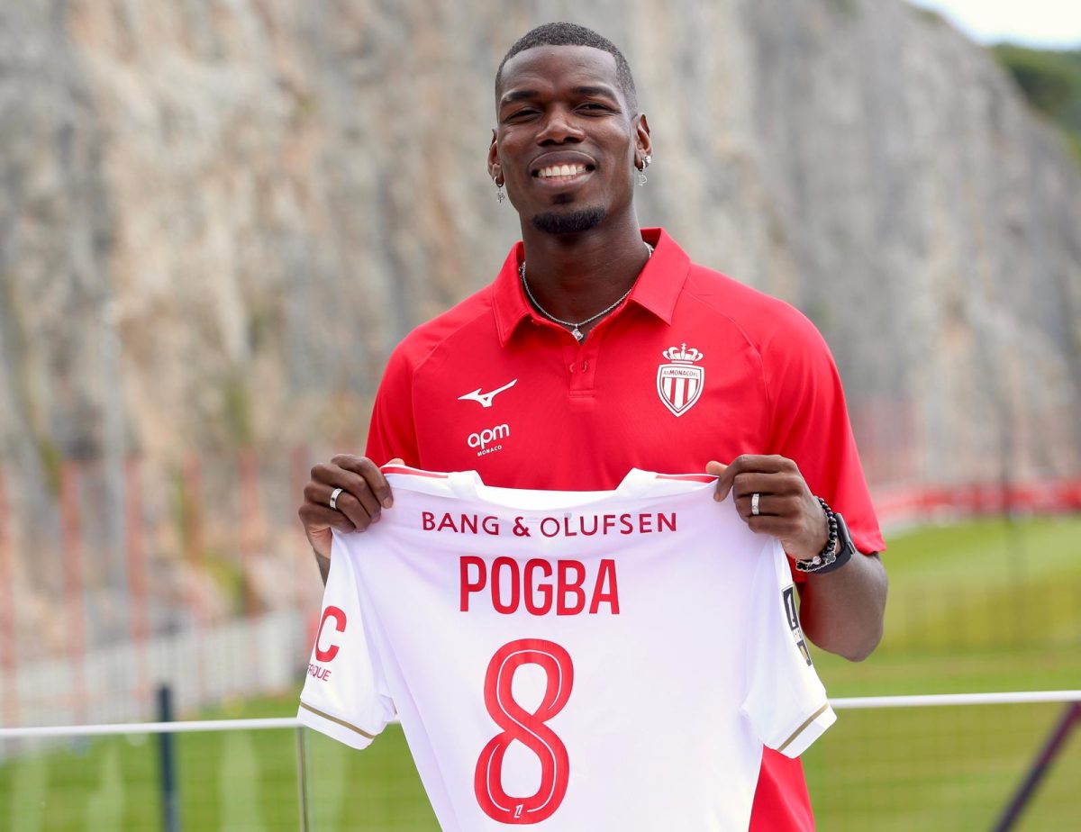 Monaco's new signing Paul Pogba posing with the team's shirt