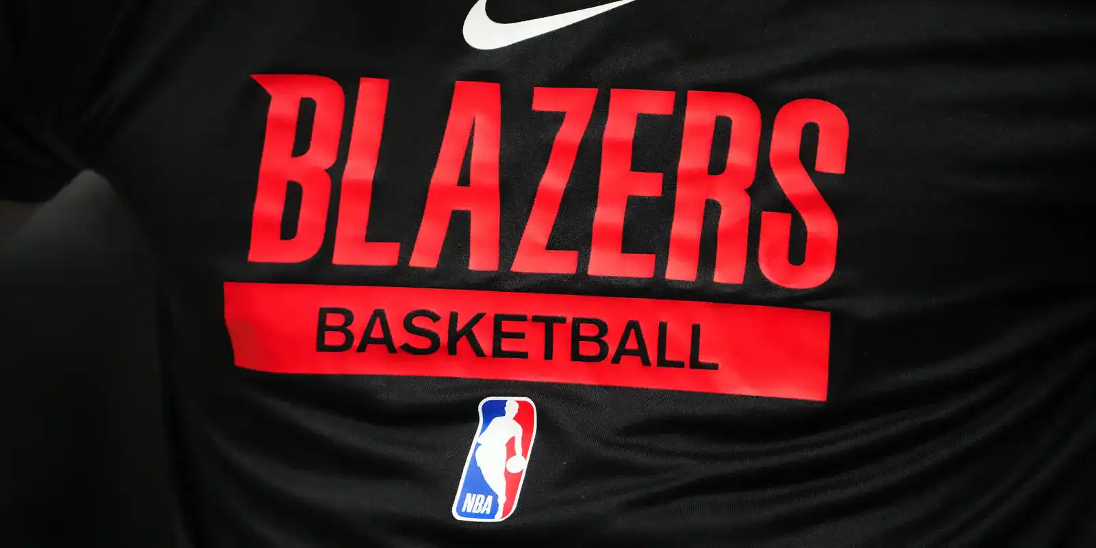 Front of a shirt with Portland Trail Blazers and NBA logo