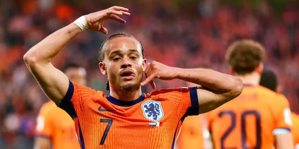 Xavi Simons celebrates after scoring for the Netherlands