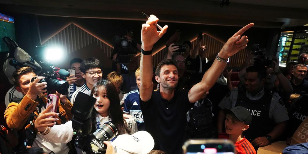 Thomas Muller arriving at Vancouver airport