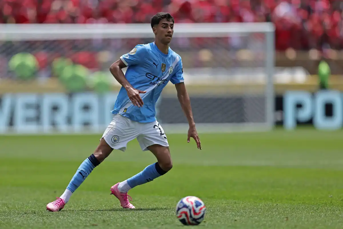 Manchester City Brazilian defender Vitor Reis receiving a pass