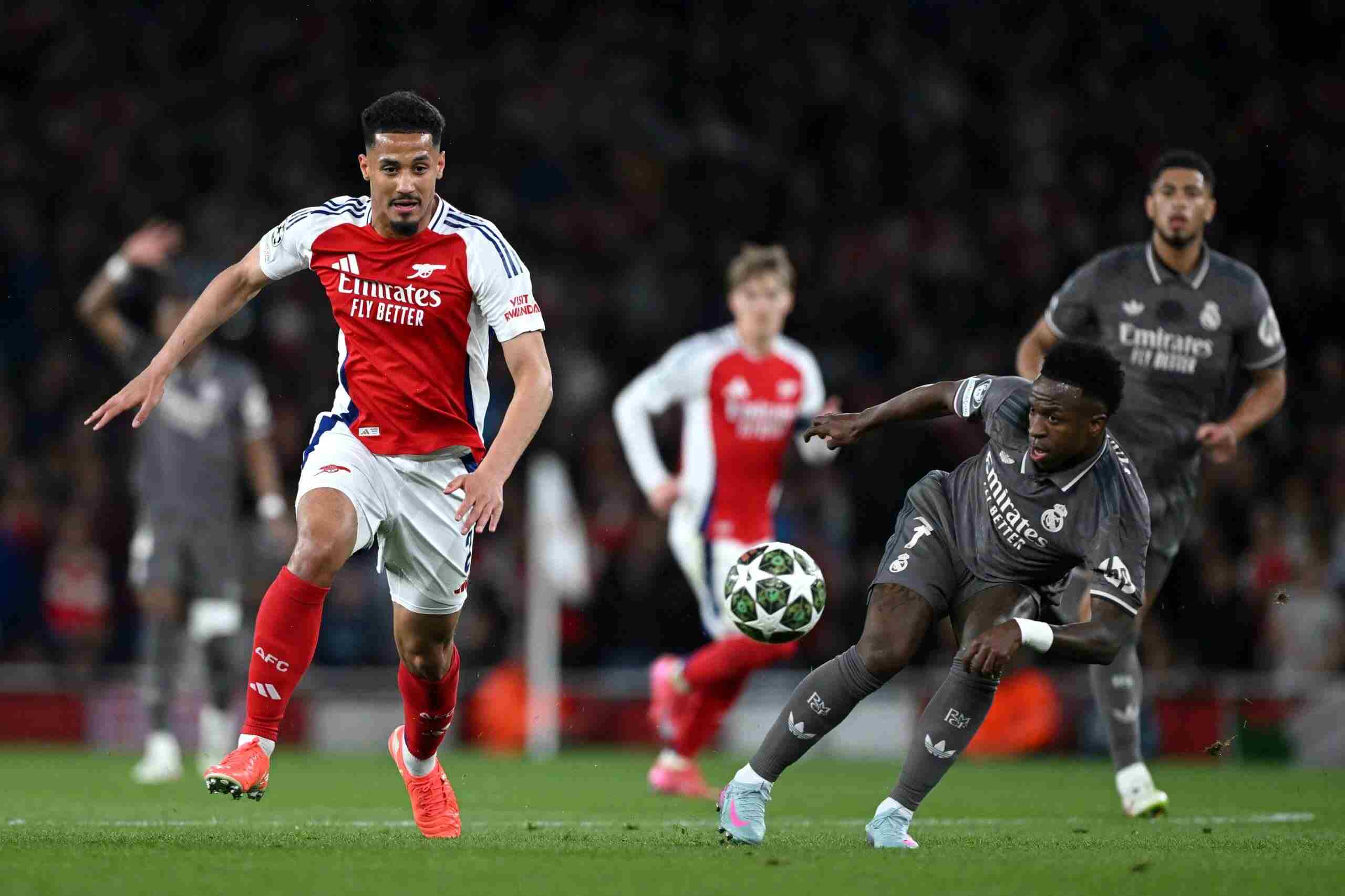William Saliba and Vinicius Jr. chasing the ball