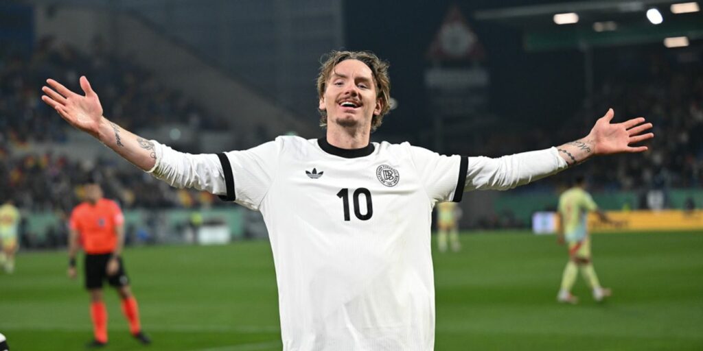Nick Woltemade celebrating after scoring for Germany U21 team