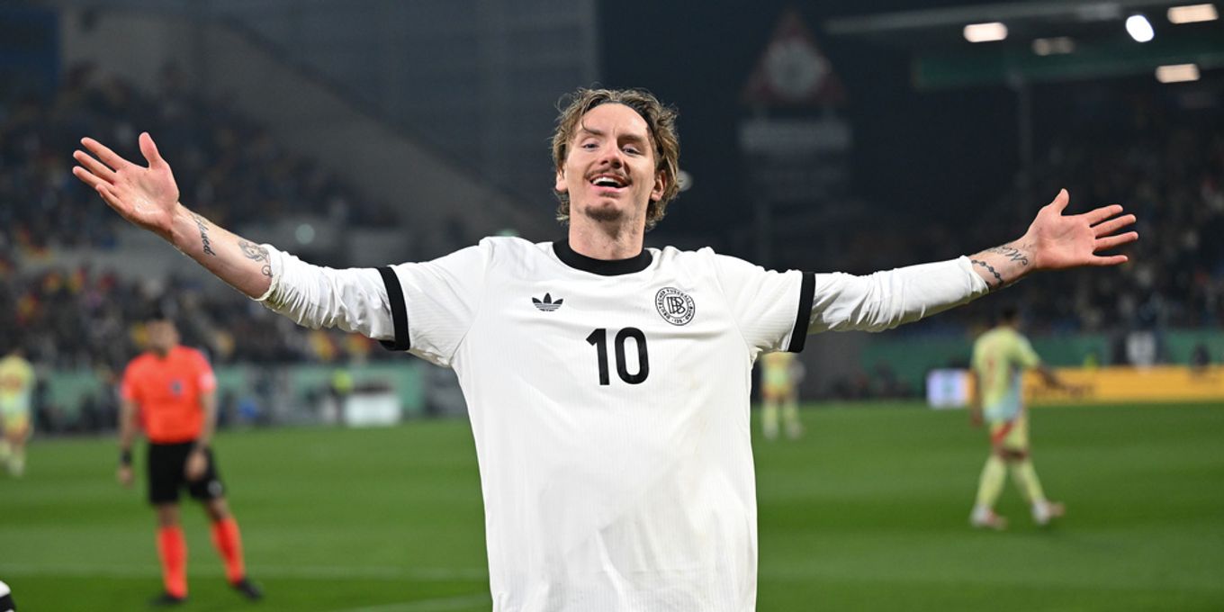 Nick Woltemade celebrating after scoring for Germany U21 team