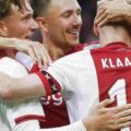 Ajax players celebrate after scoring a goal