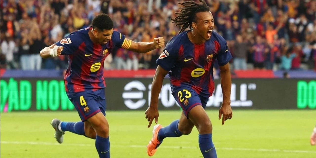 Joules Kounde celebrates after scoring against Real Sociedad