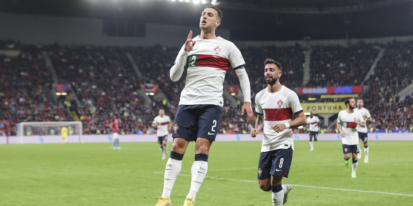 Diogo Dalot celebrates after scoring a goal for Portugal
