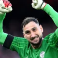 Gianluigi Donnarumma with hands in the air