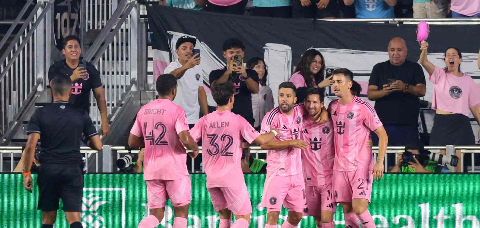 Inter Miami players celebrate after scoring a goal against Seattle Sounders