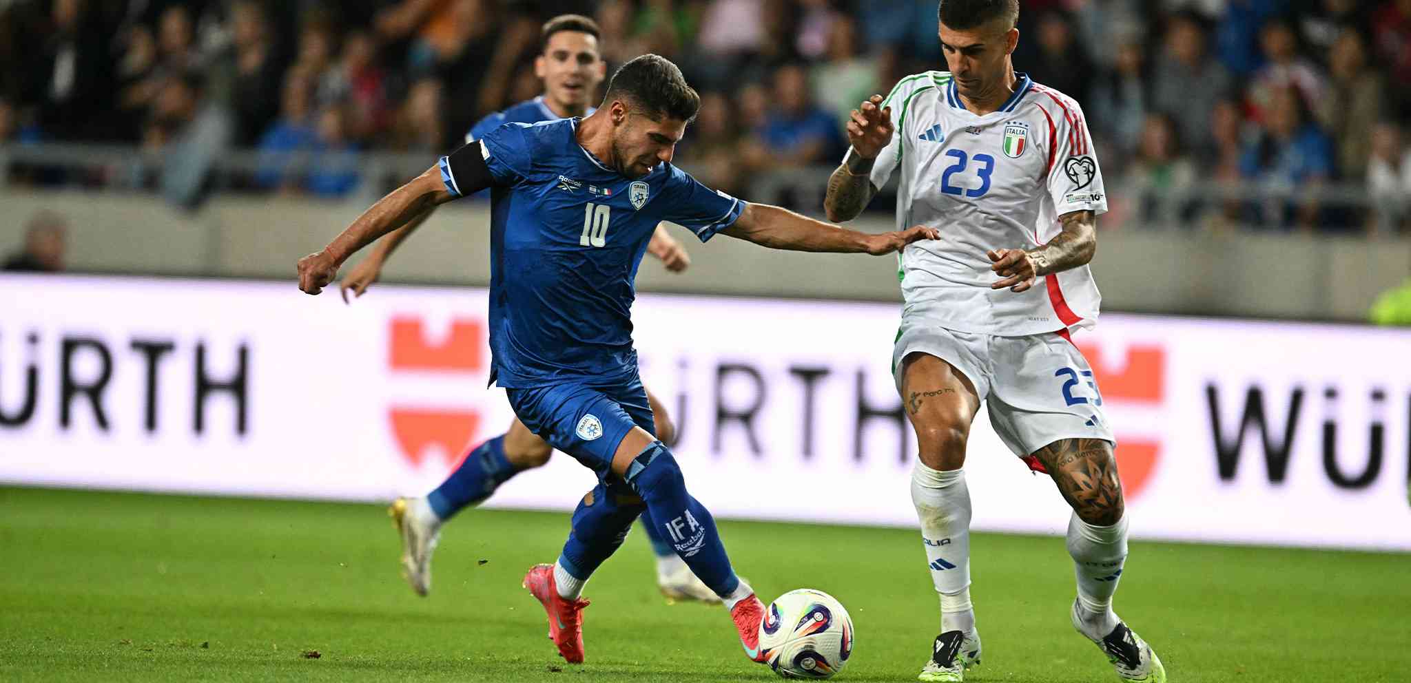 Manor Salomon and Alessandro Bastoni during the World Cup Qualifier between Israel and Italy