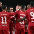 Liverpool players congratulate Andy Robertson after his goal against Atletico Madrid
