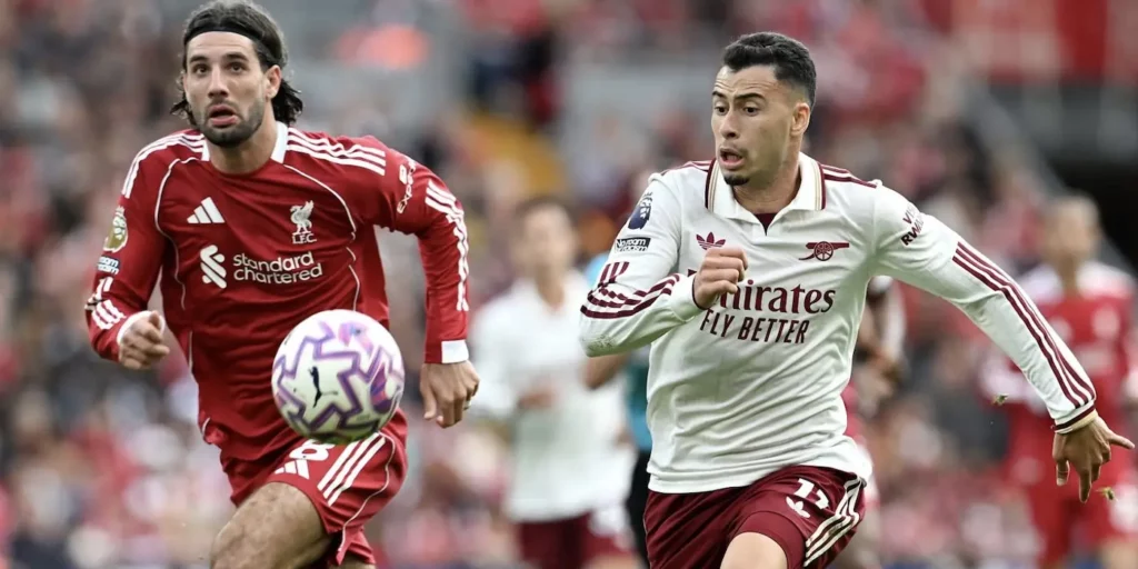 Dominic Szoboszlai and Gabriel Martinelli chasing the ball