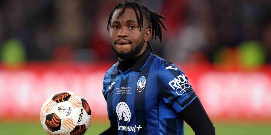Ademola Lookman holding a ball