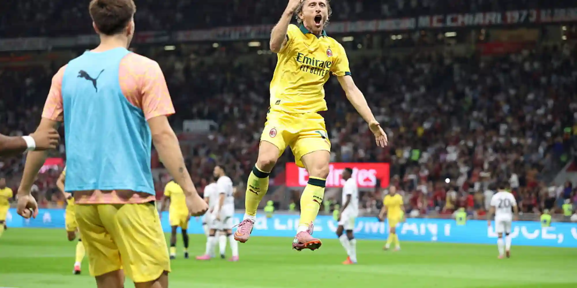 Luka Modric celebrates his first goal for Milan