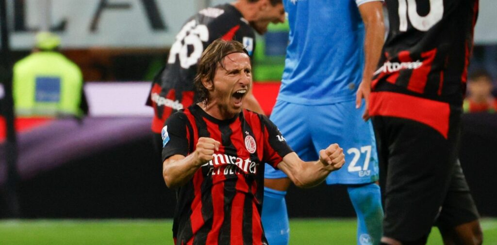Luka Modric celebrates Milan's win over Napoli