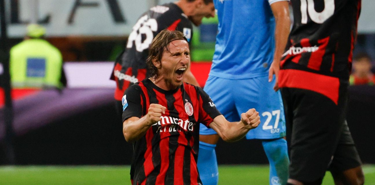Luka Modric celebrates Milan's win over Napoli