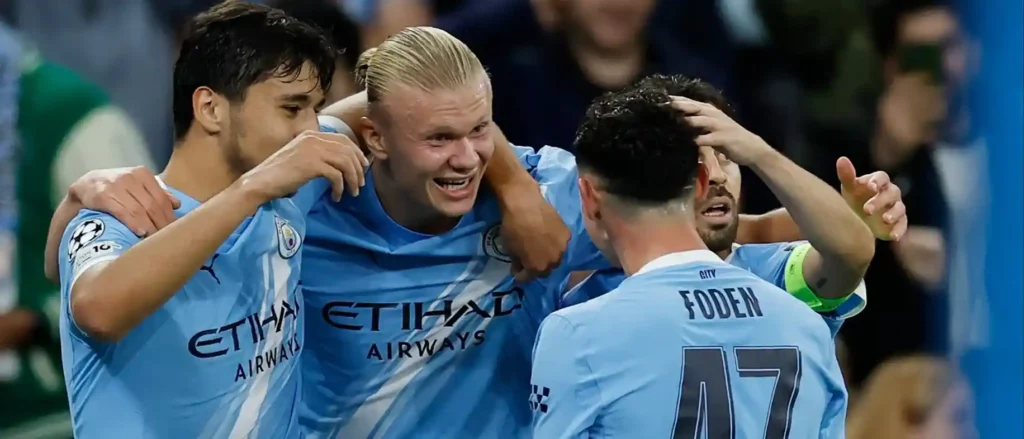 Manchester City celebrate after scoring against Napoli