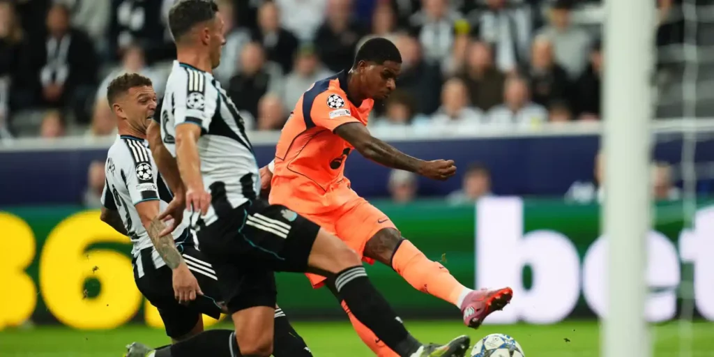 Marcus Rashford shoots towards Newcastle goal