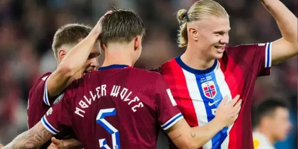 Norway players celebrate after scoring another goal in the 11-1 win over Moldova