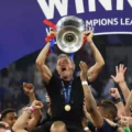 PSG head coach Luis Enrique lifting the Champions League trophy