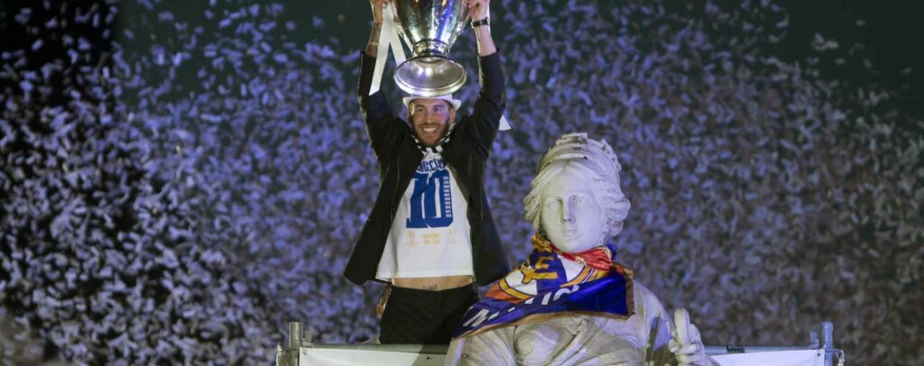 Sergio Ramos lifting the Champions League trophy at Cibeles