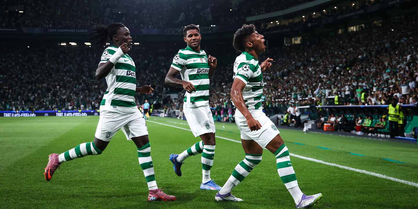 Sporting players celebrate after scoring against Kairat