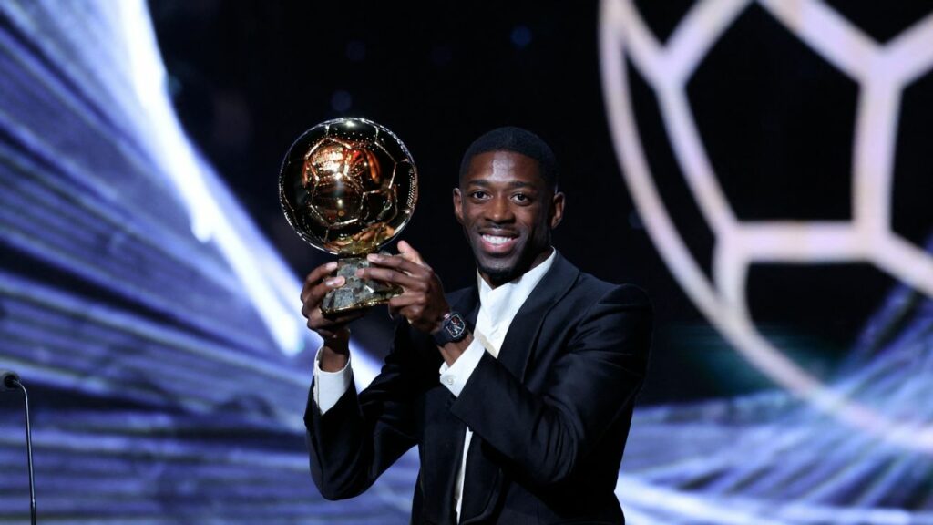 Ousmane Dembele with the Ballon d'Or trophy