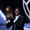 Ousmane Dembele with the Ballon d'Or trophy