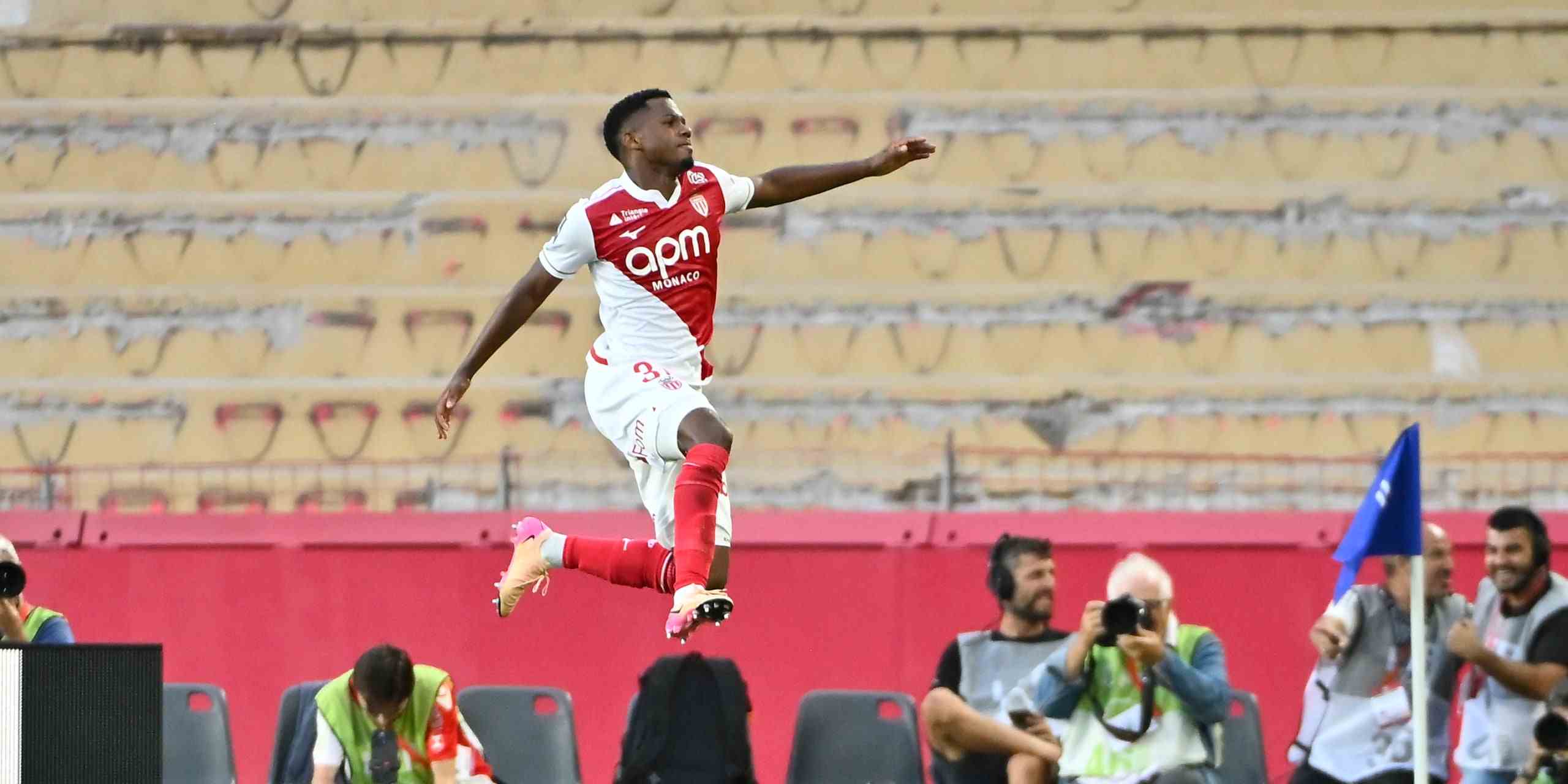 Ansu Fati jumping in the air after scoring for Monaco