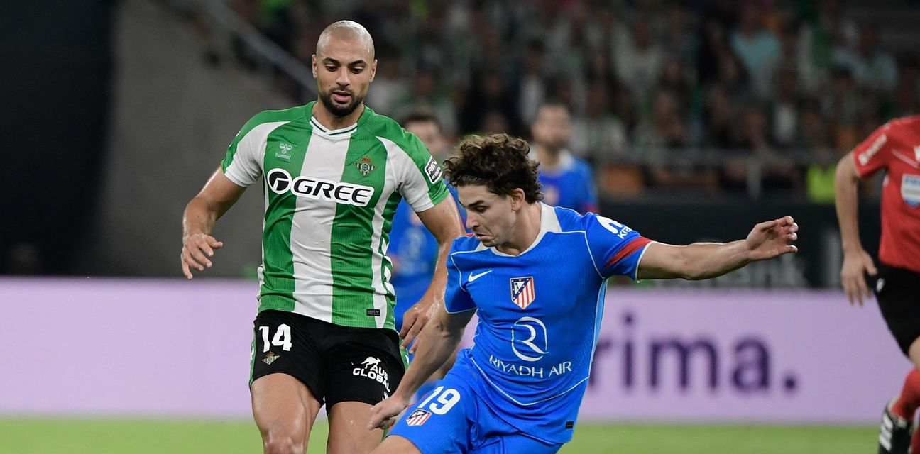 Julian Alvarez chased by Betis player