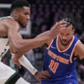 Giannis Antetokounmpo guarding Jalen Brunson
